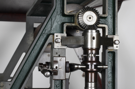 Recording device: toothed coupling